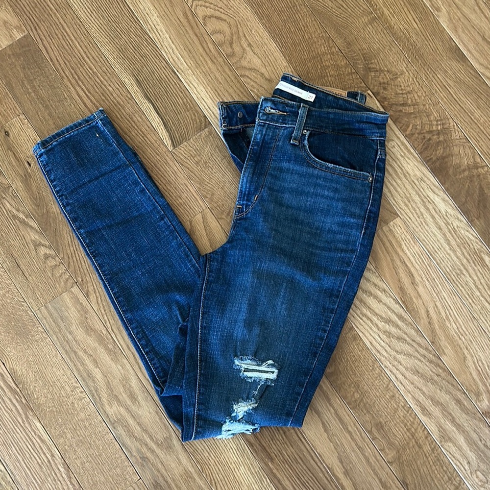 Levi’s Deep Blue Skinny Jeans with Faded Distressing